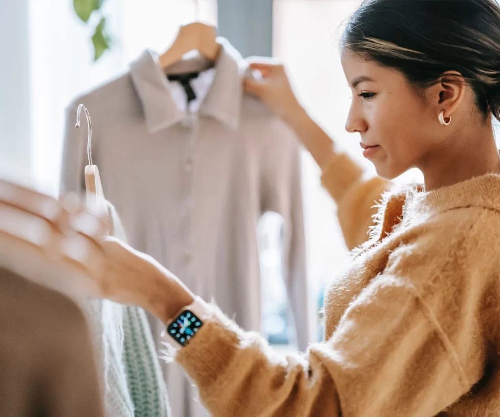 An image consultant selecting outfits